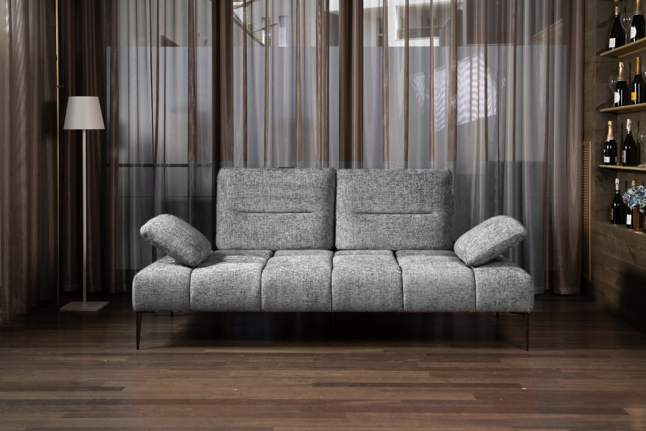 Modern gray Canapé Soul sofa with adjustable armrests in a stylish living room.